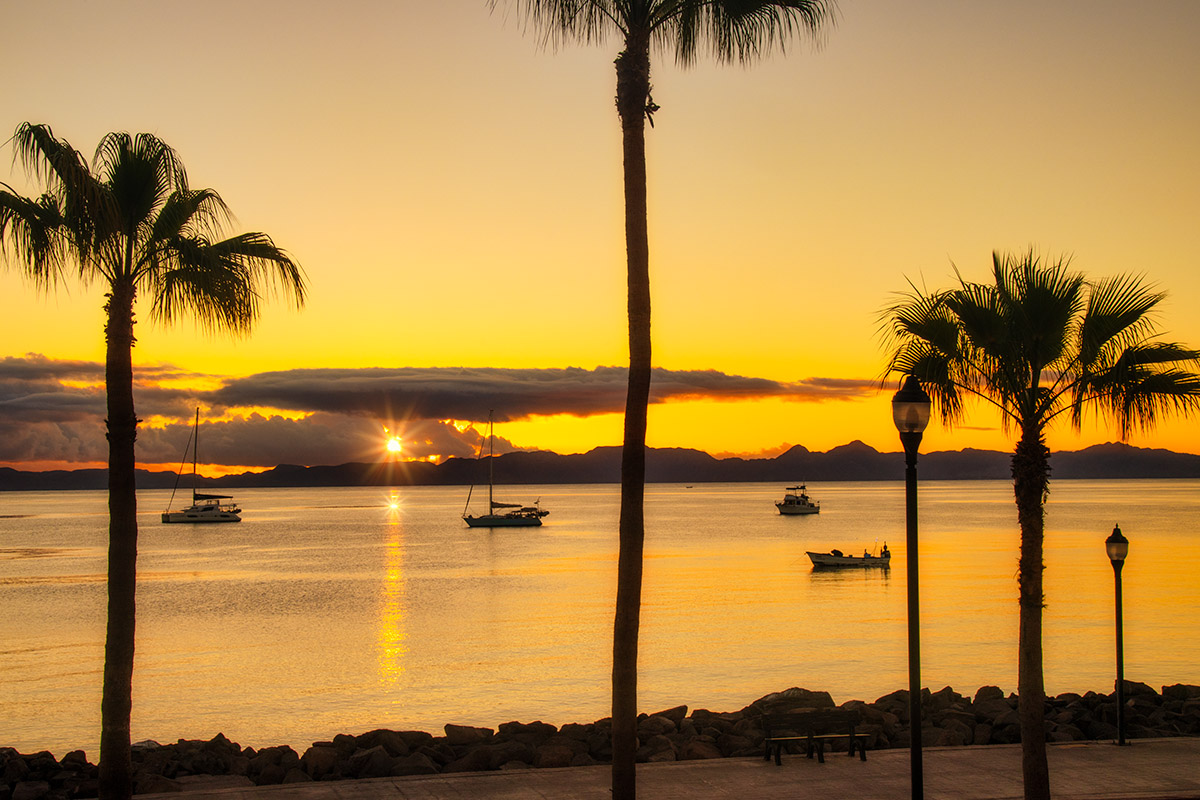 Golden hour sunset on the Loreto malecón with Sea of Cortez views