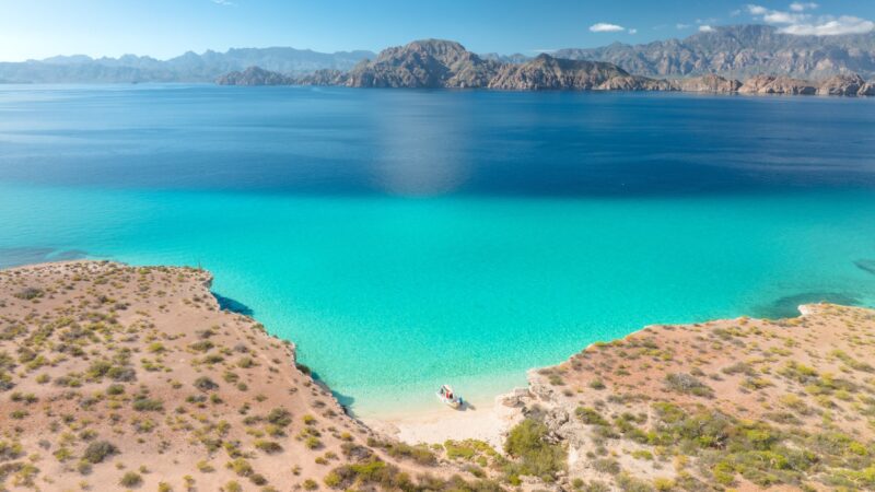 Island hopping boat day in Loreto with turquoise Sea of Cortez water