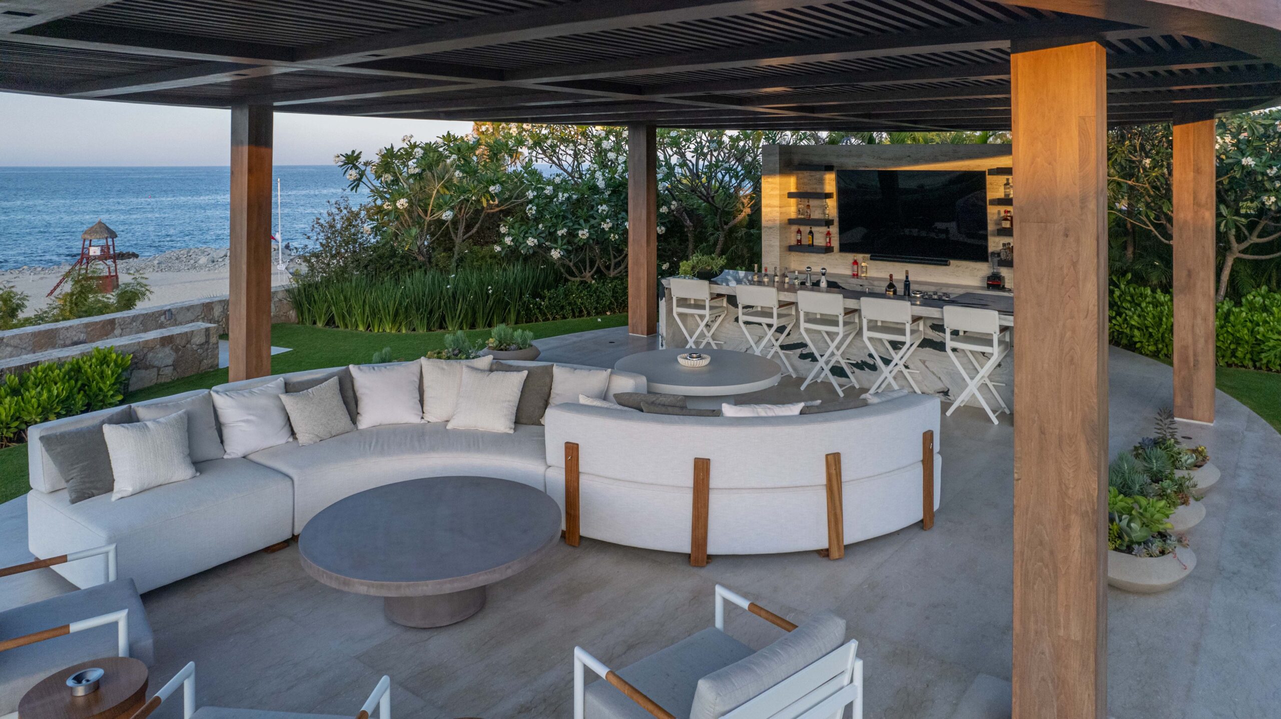 Casa Elije patio with outdoor seating and bar in Palmilla Los Cabos
