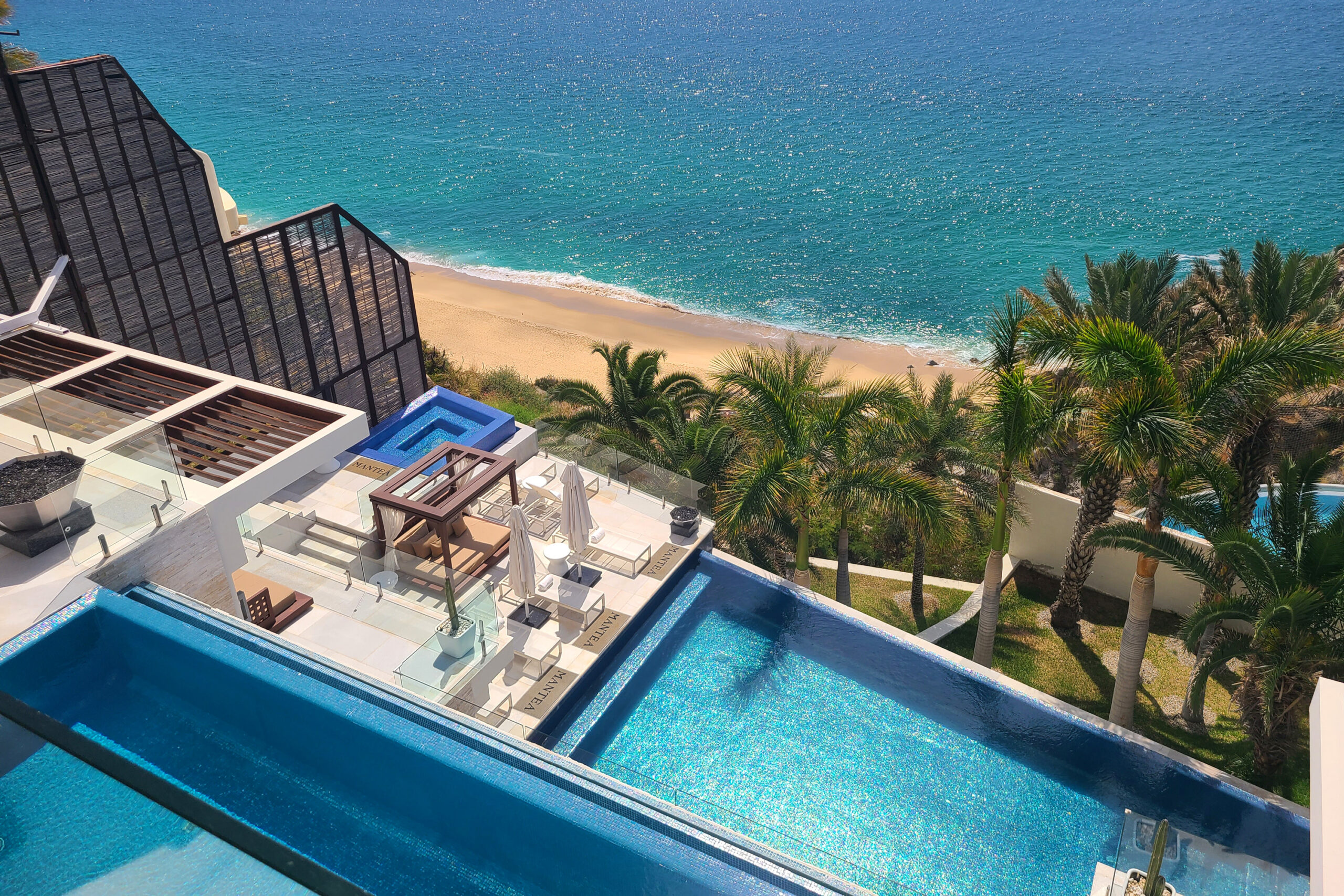 Mantea Casa Cabo exterior view of pools jacuzzi and ocean view