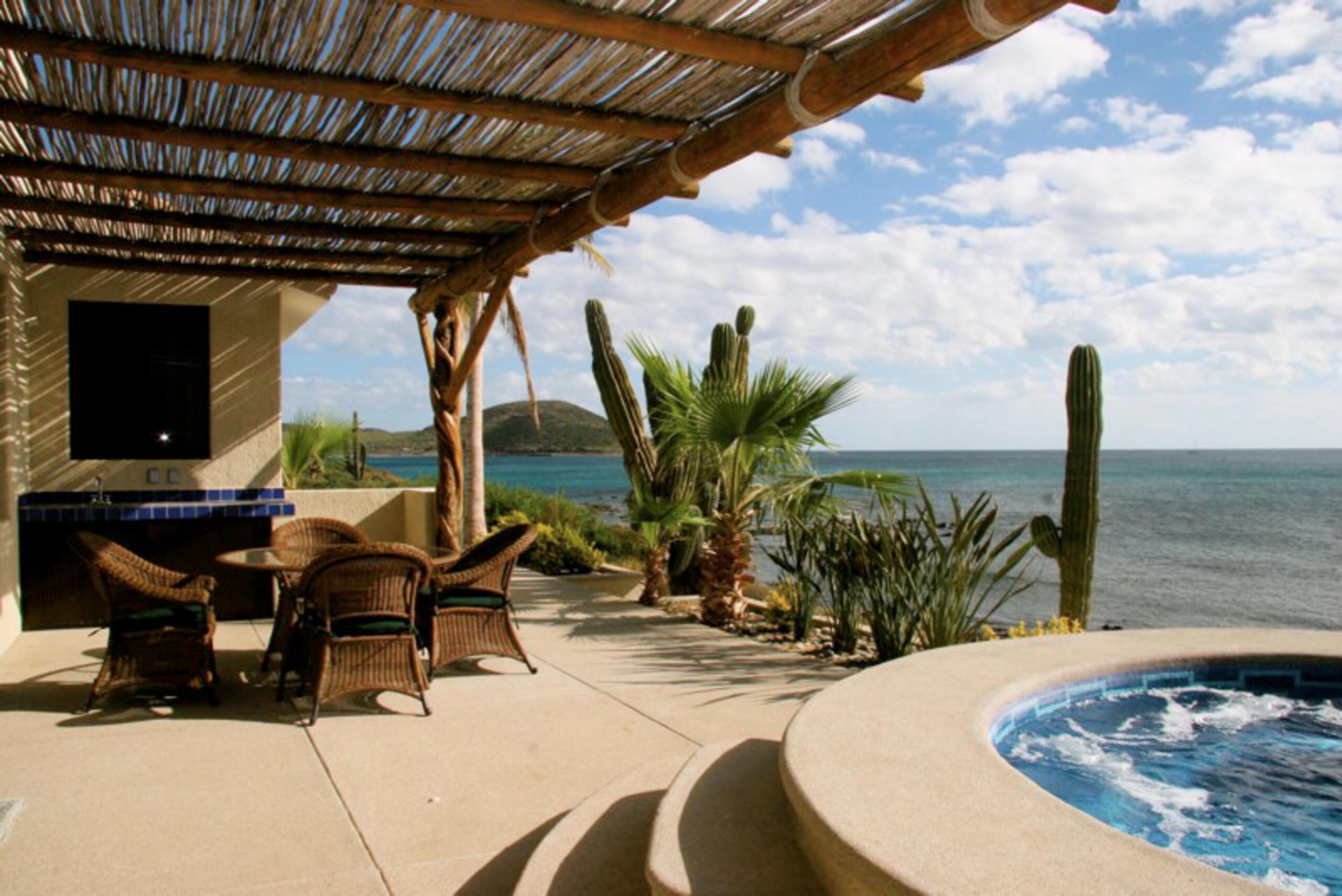 Rancho De Costa patio with jacuzzi and ocean view in Rancho De Costa, Beachfront Los Cabos
