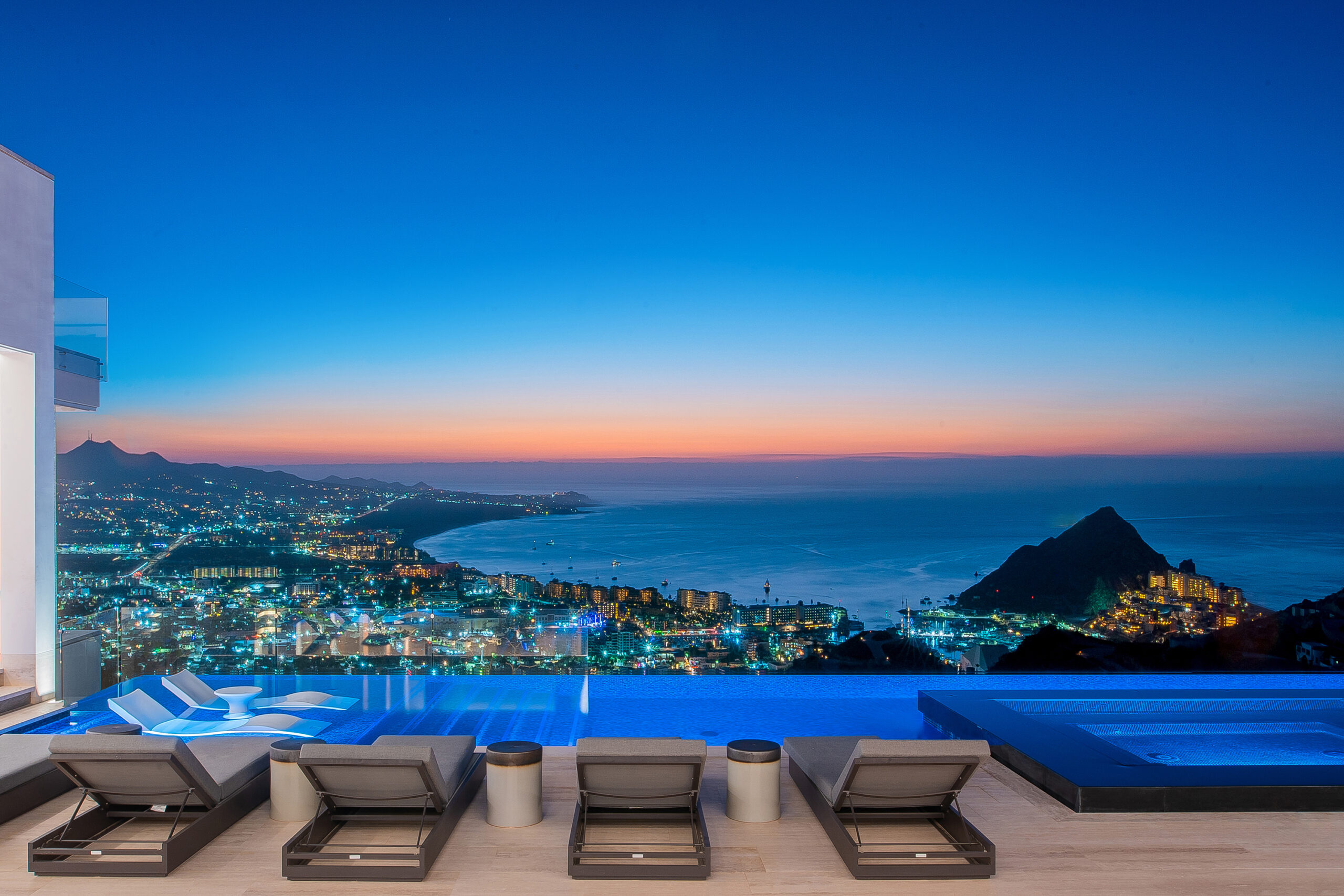 Villa Aurora lounge poolside with incredible views in Pedregal Pacific, Marina View Los Cabos