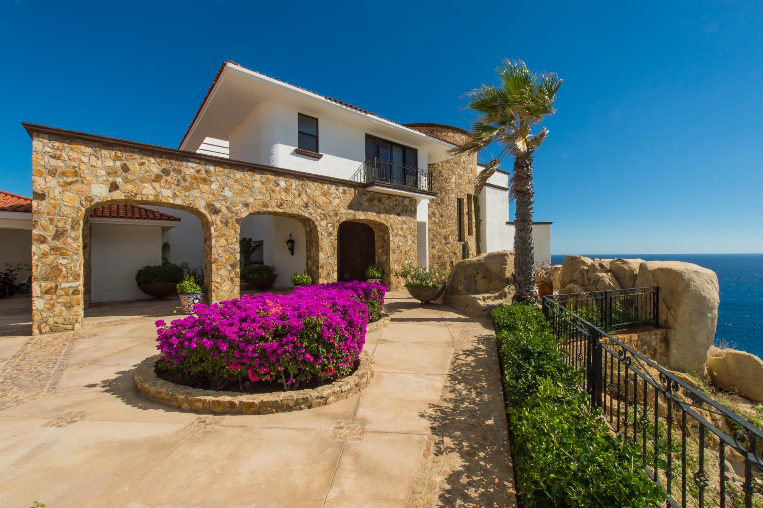 Villa Grande garden and stone driveway in Pedregal Pacific, Oceanfront Los Cabos