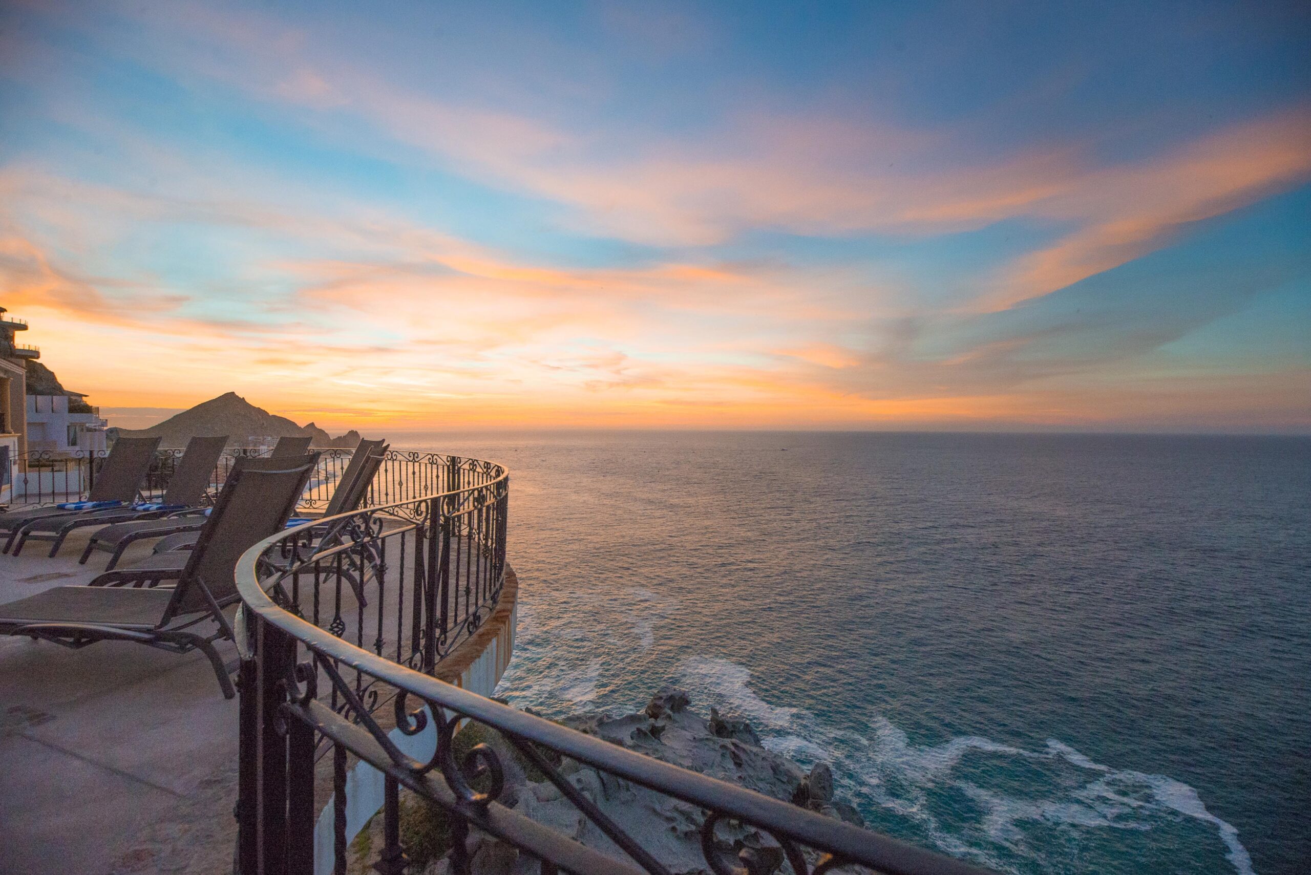 Villa Grande sunrise cliff side views from pool patio in Pedregal Pacific, Oceanfront Los Cabos