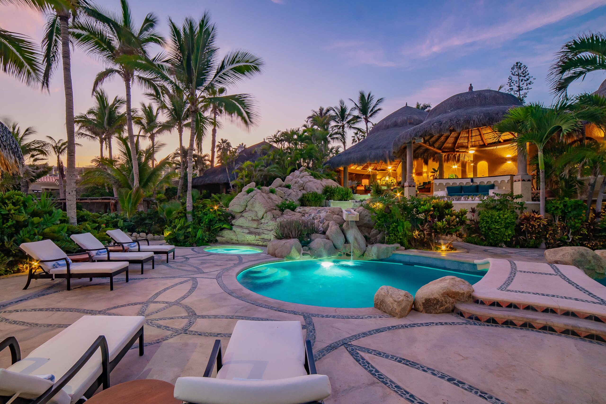 Villa Las Rocas poolside view of patio during sunset in Costa Brava, Beachfront Los Cabos