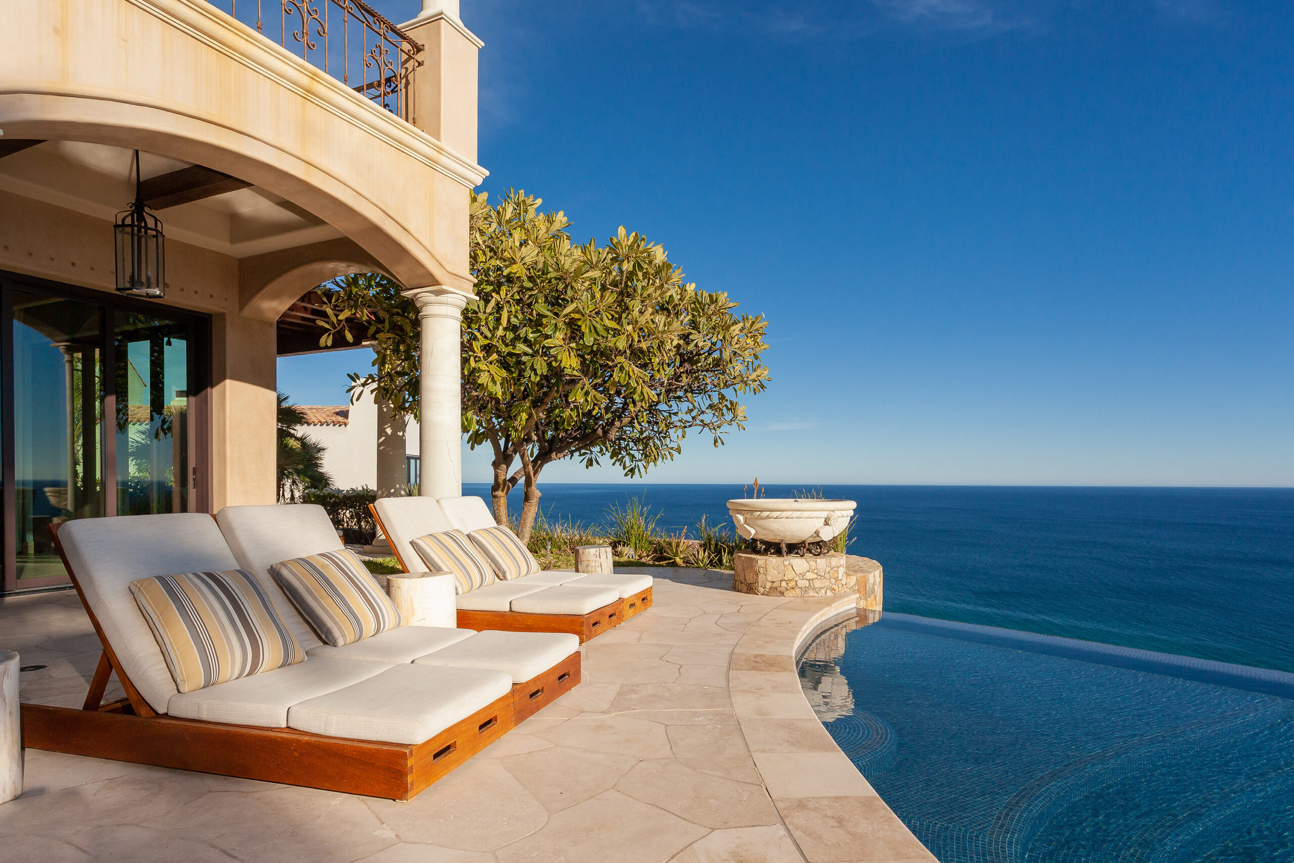 Villa Mar Azul Palmilla lounge chairs by poolside with ocean views