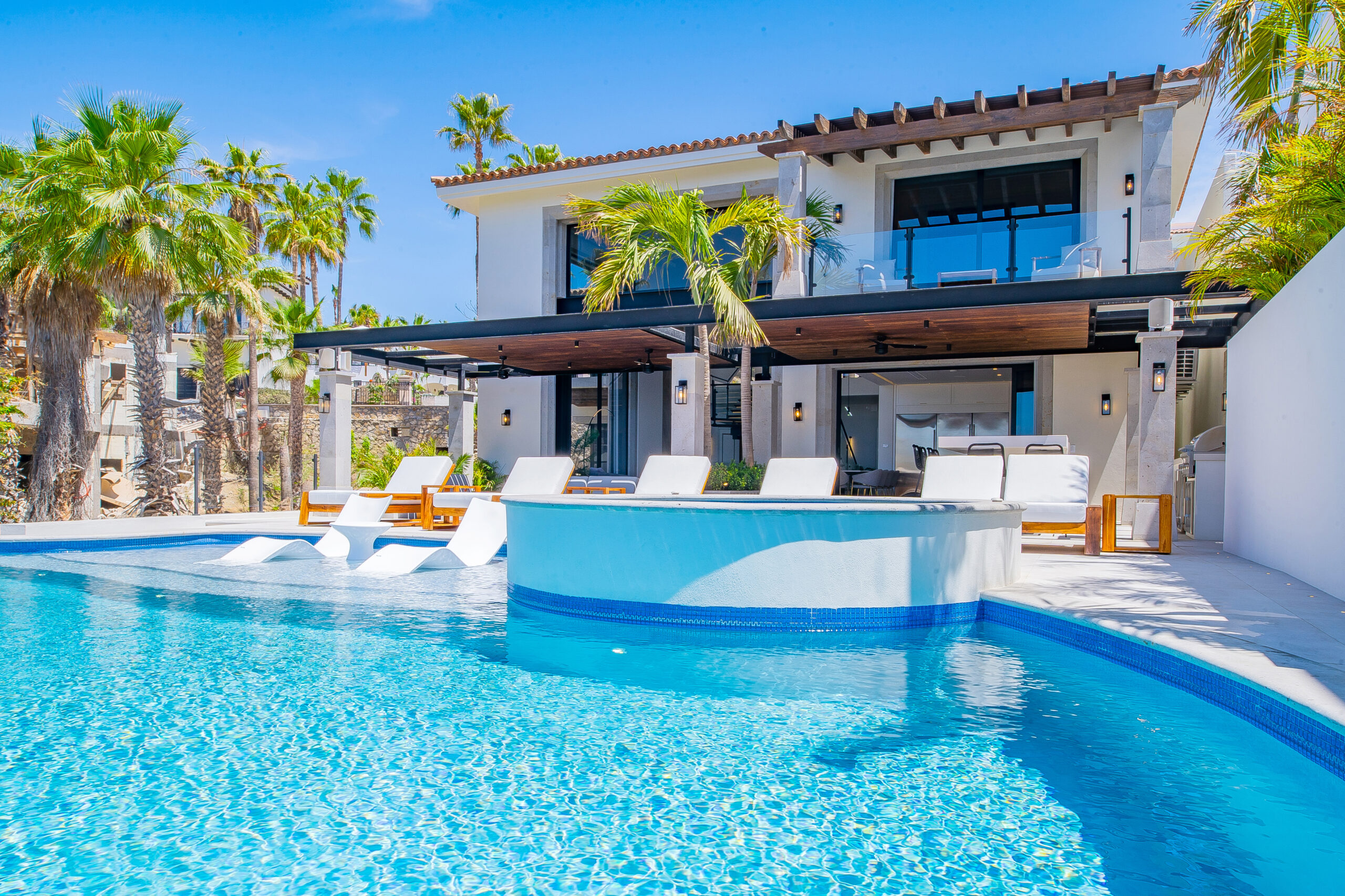 Villa Mareas poolside view of exterior in Cabo Bello, Swimmable Beach Los Cabos