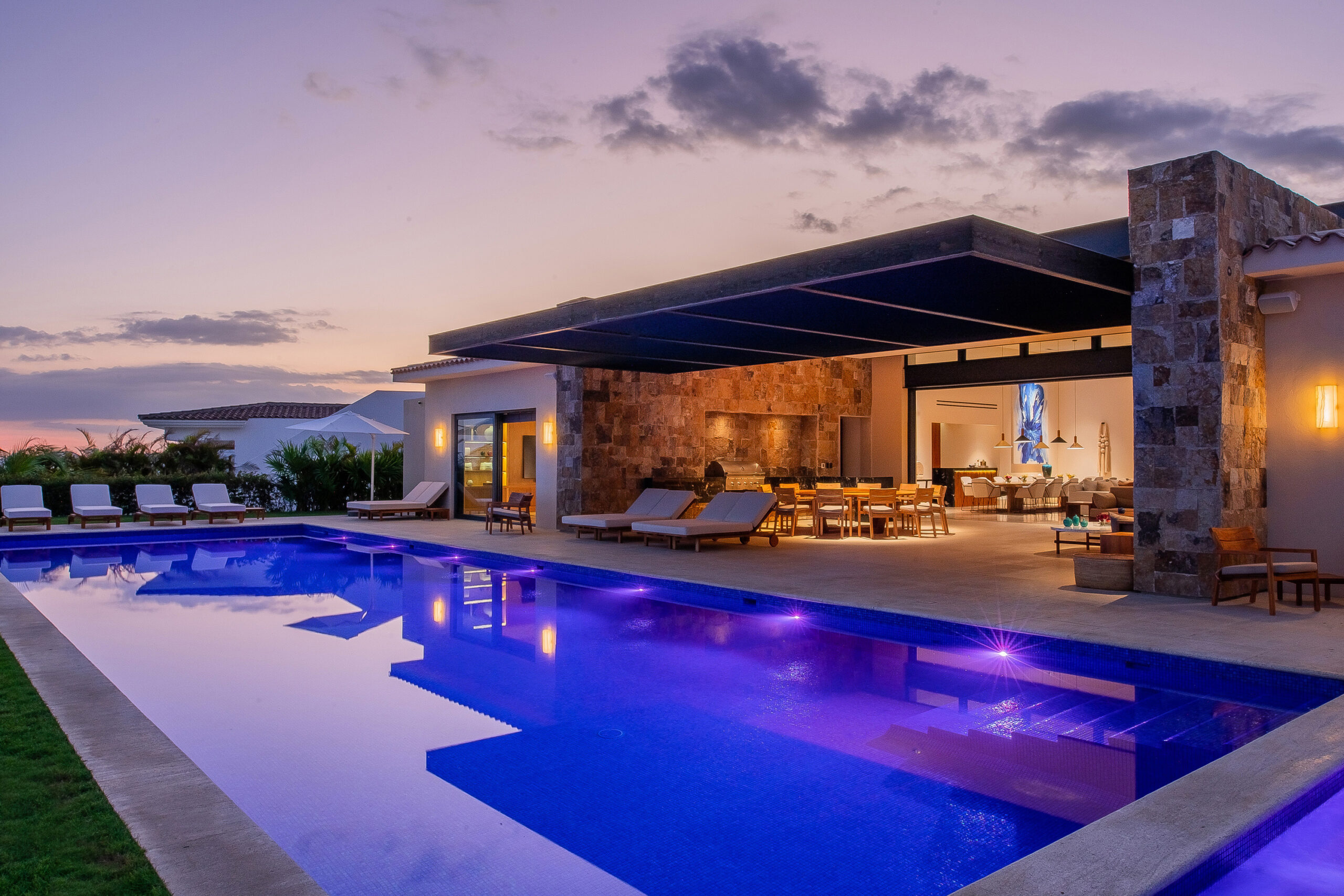 Villa Saguaro poolside view of exterior during sunset in Puerto Los Cabos