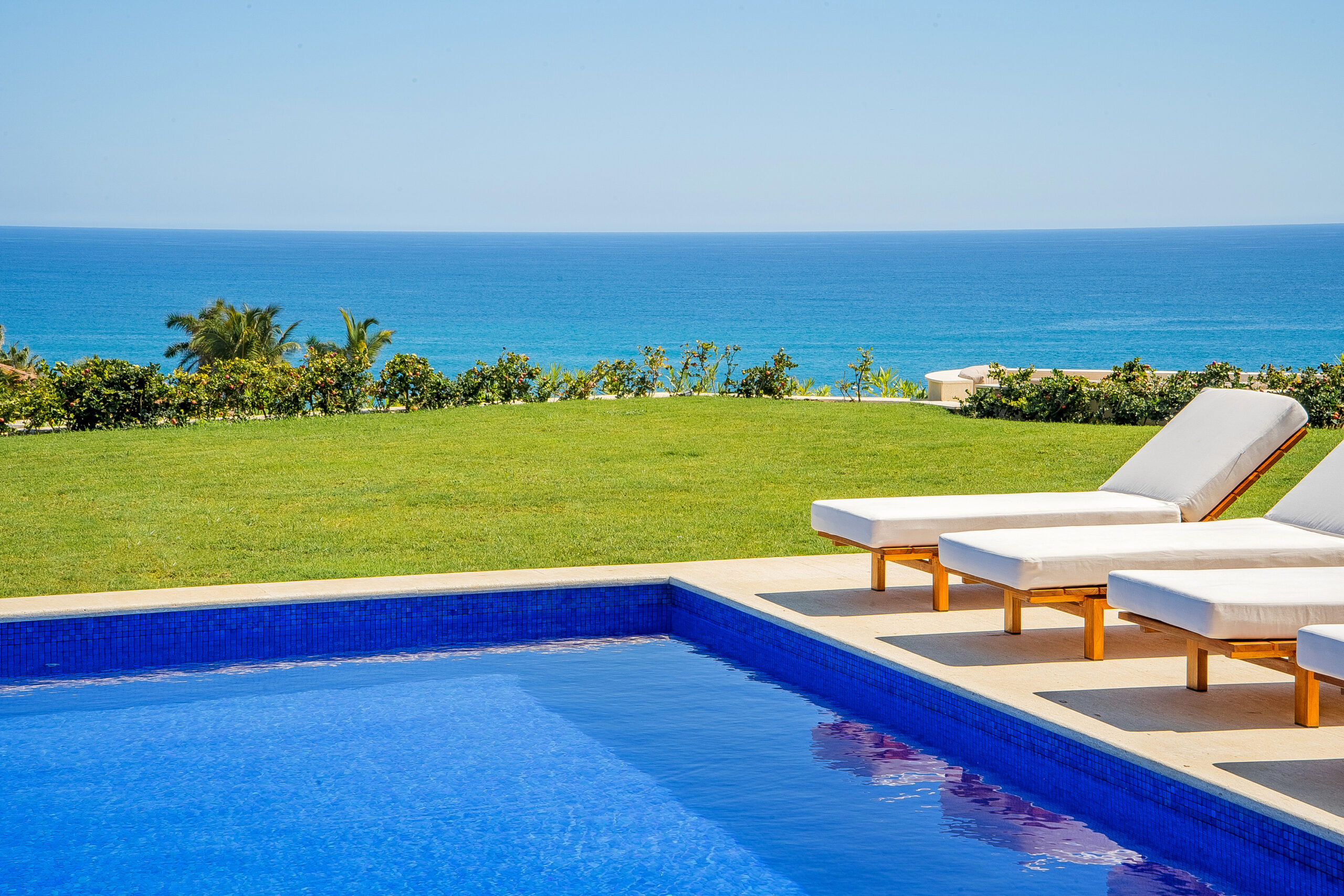 Villa Saguaro sunny poolside with incredible ocean views in Puerto Los Cabos