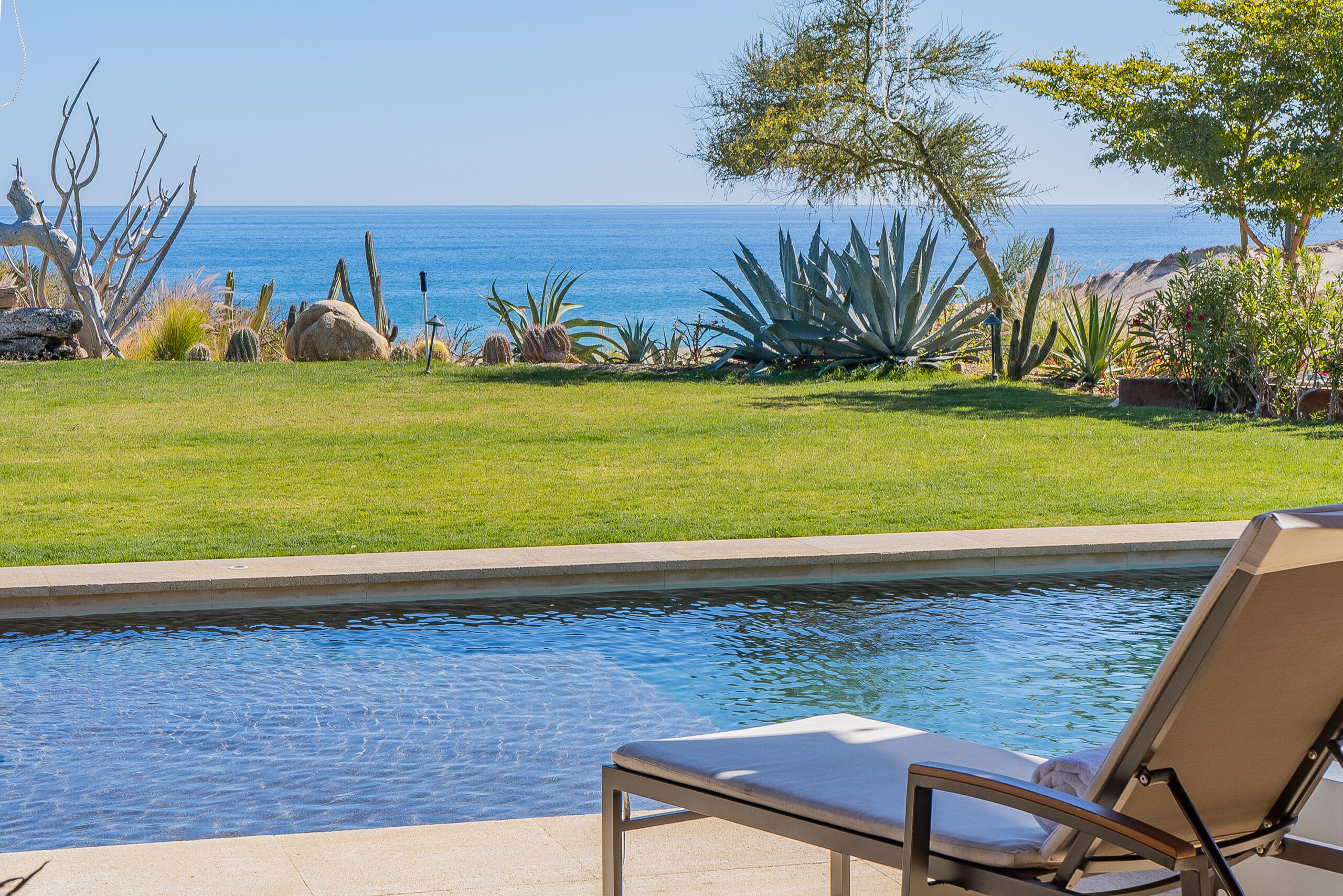 West Enclave 8 poolside patio with ocean view in Puerto Los Cabos, Family Friendly Los Cabos