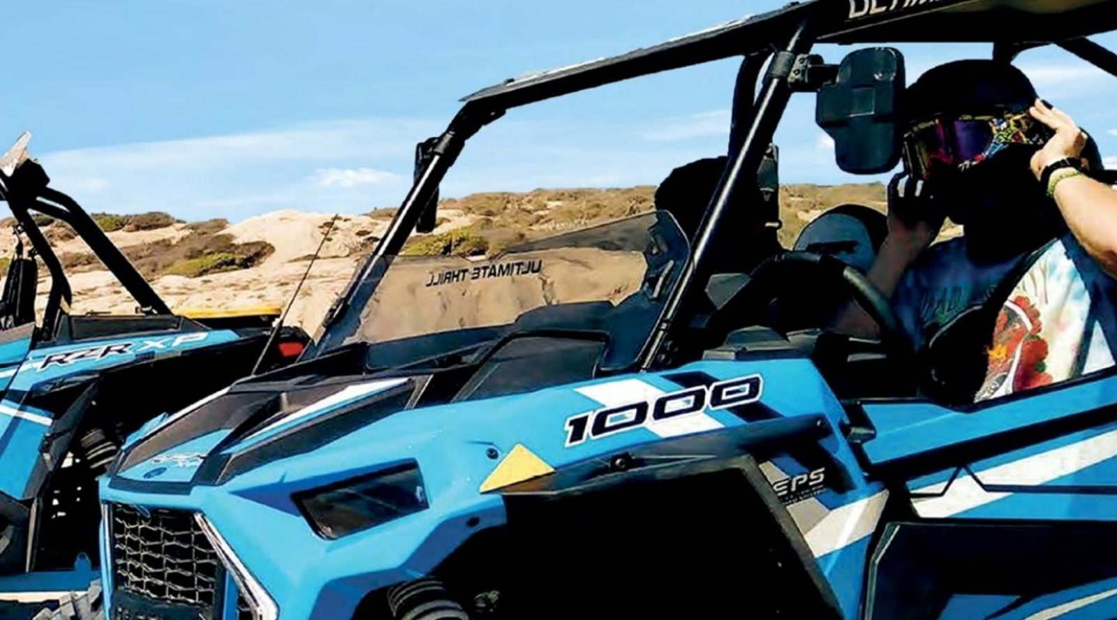 Off-road buggy in the Los Cabos desert from the Book Baja 2026 Guide