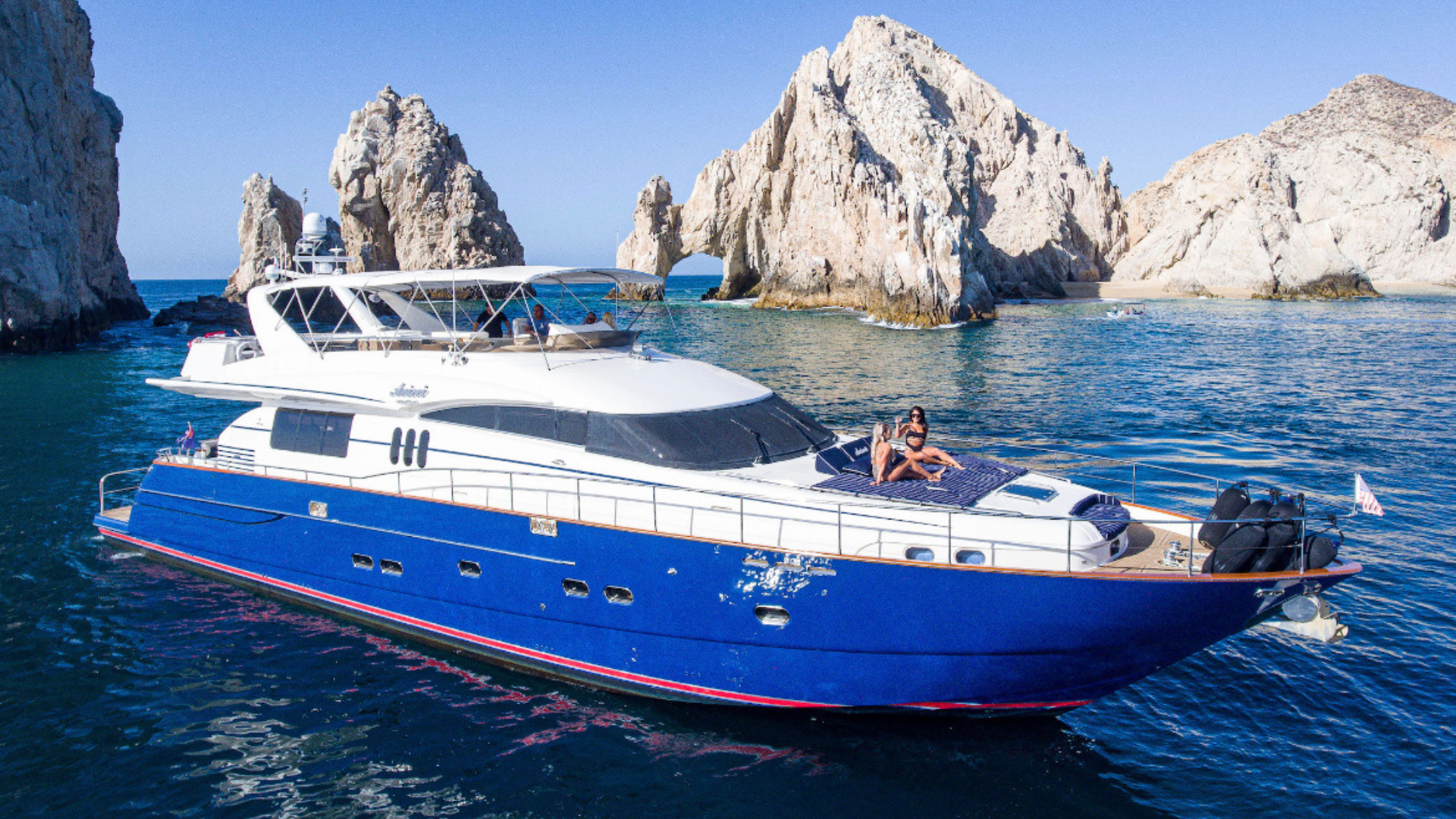 Avicci 85ft Viking Princess party yacht charter at the Cabo Arch