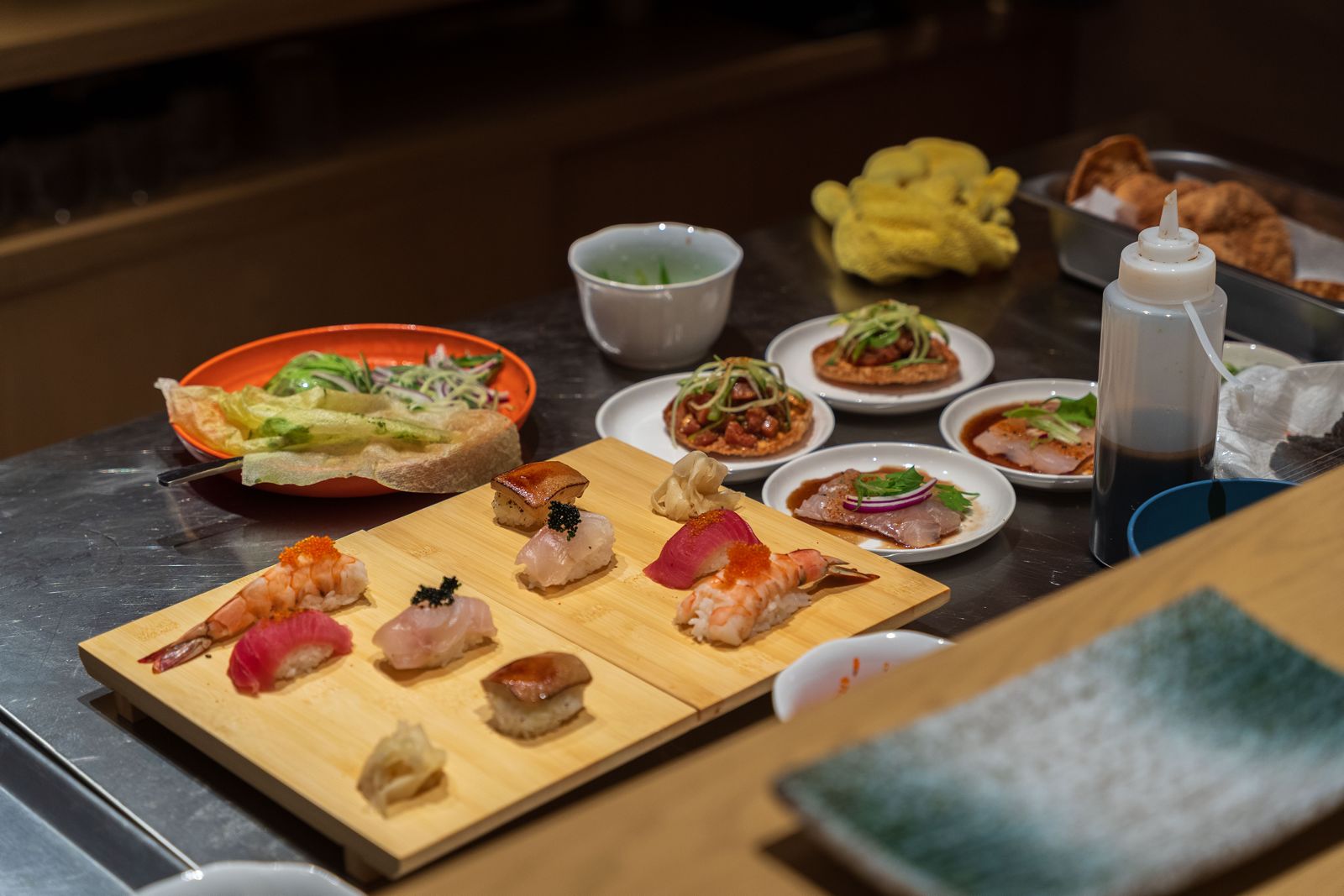 Chef-prepared nigiri and Japanese dishes at Casa La Maraca's private sushi restaurant