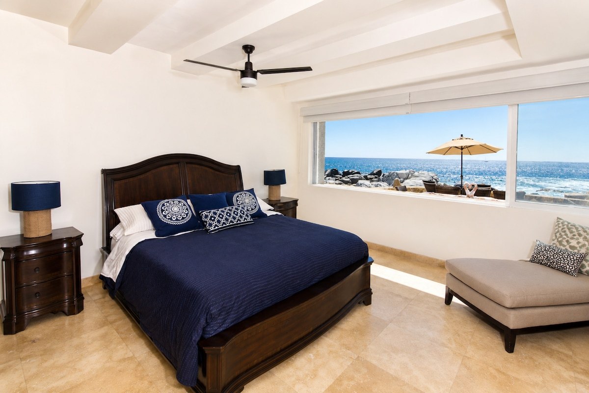 Primary king bedroom at Casa Luna with a direct view toward Land's End