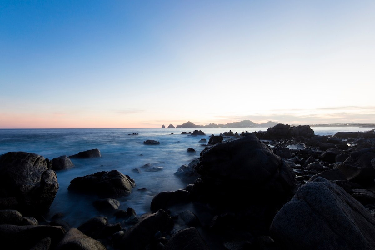 Rocky Sea of Cortez coastline at sunrise directly in front of Casa Luna