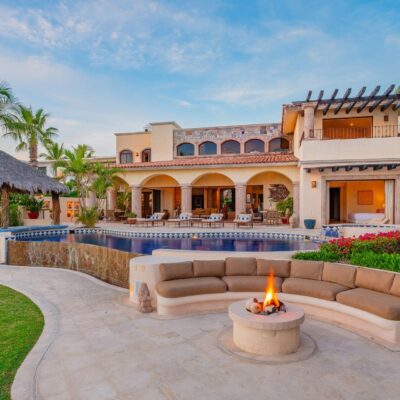 Casa Lolita in Cabo del Sol, Los Cabos Tourist Corridor — Villa exterior and firepit at dusk
