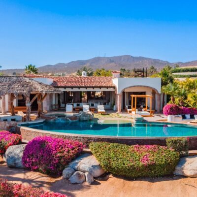 Casa Mar in Cabo del Sol, Los Cabos Tourist Corridor — Villa exterior, pool and flowering gardens